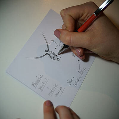 hand sketching a jewellery design